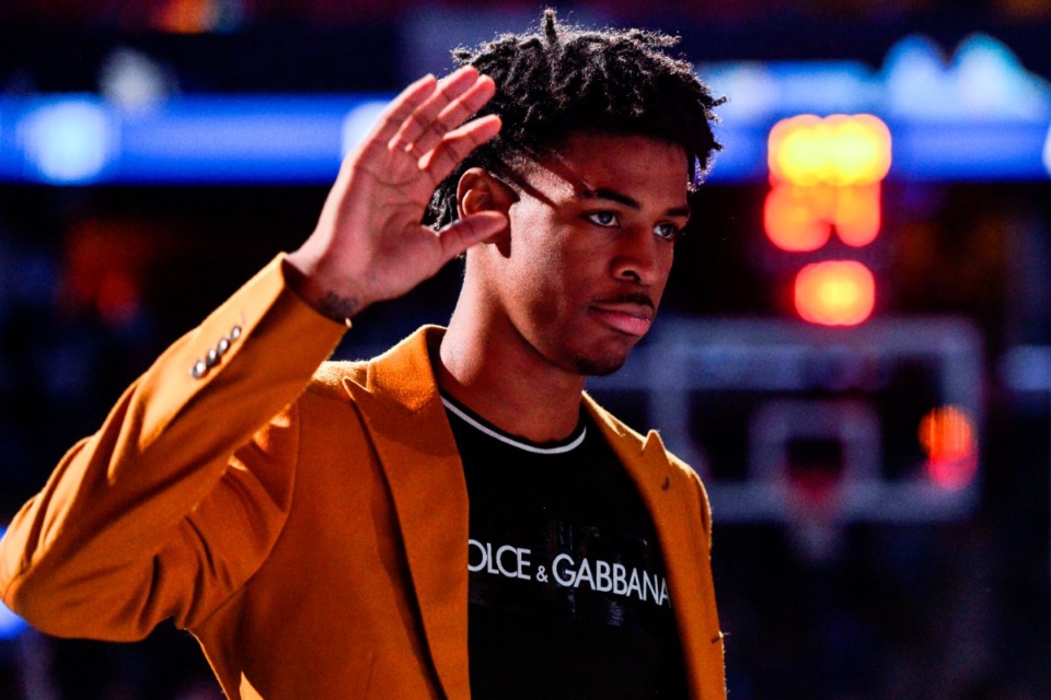 <strong>Memphis Grizzlies guard Ja Morant stands on the court before an NBA basketball game against the Indiana Pacers Monday, Dec. 2, 2019, in Memphis, Tenn.</strong> (AP Photo/Brandon Dill)