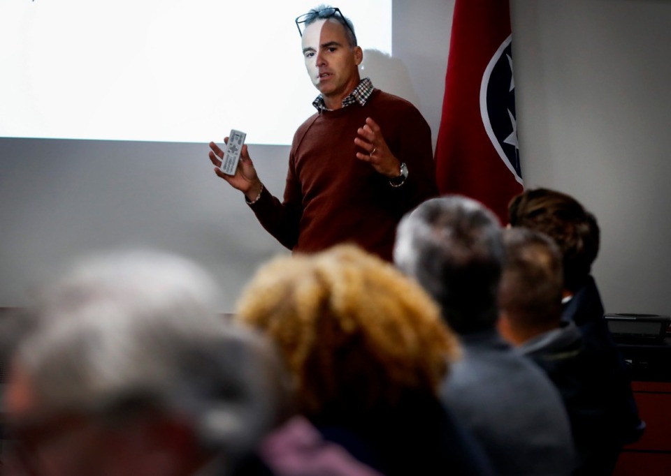 <strong>Carrier Corp. project manager Ben Brantley addresses the Shelby County Groundwater Board on Tuesday, Dec. 10, in Bartlett. A request by Carrier to inject treated water into the Memphis Sand aquifer near its Collierville plant was tabled by the board.</strong> (Mark Weber/Daily Memphian)