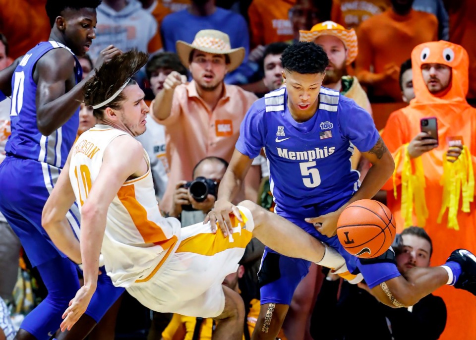 <strong>Memphis guard Boogie Ellis (right) grabs a loose ball away from Tennessee defender John Fulkerson (left) during action Saturday, Dec. 14, 2019 in Knoxville, Tennessee.</strong> (Mark Weber/Daily Memphian)