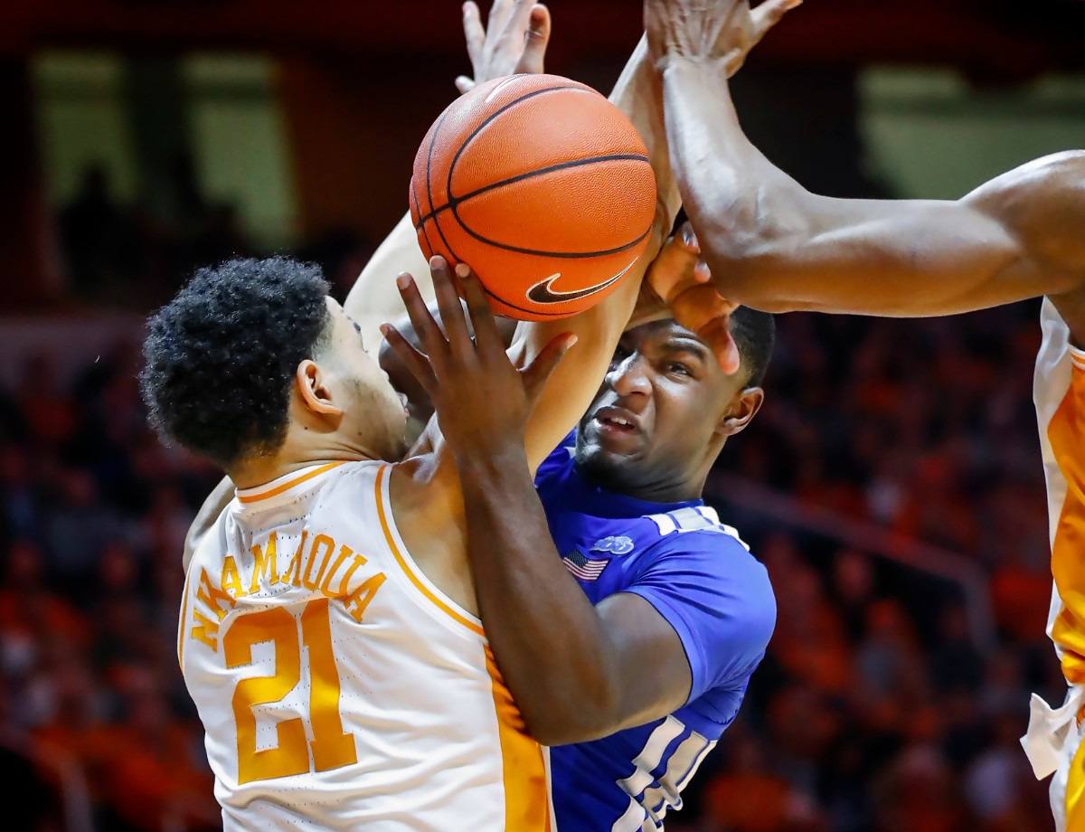 <strong>Memphis guard Alex Lomax (right) is fouled by Tennessee defender Olivier Nkamhoua (left) during action Saturday, Dec. 14, 2019 in Knoxville, Tennessee.</strong> (Mark Weber/Daily Memphian)