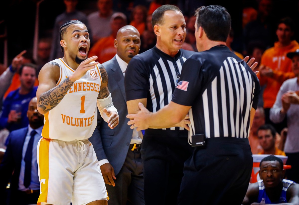 <strong>Tennessee guard Lamonte Turner (left) reacts while the officials confer on who knocked the ball out of bounds during action against Memphis Saturday, Dec. 14, 2019 in Knoxville, Tennessee.</strong> (Mark Weber/Daily Memphian)