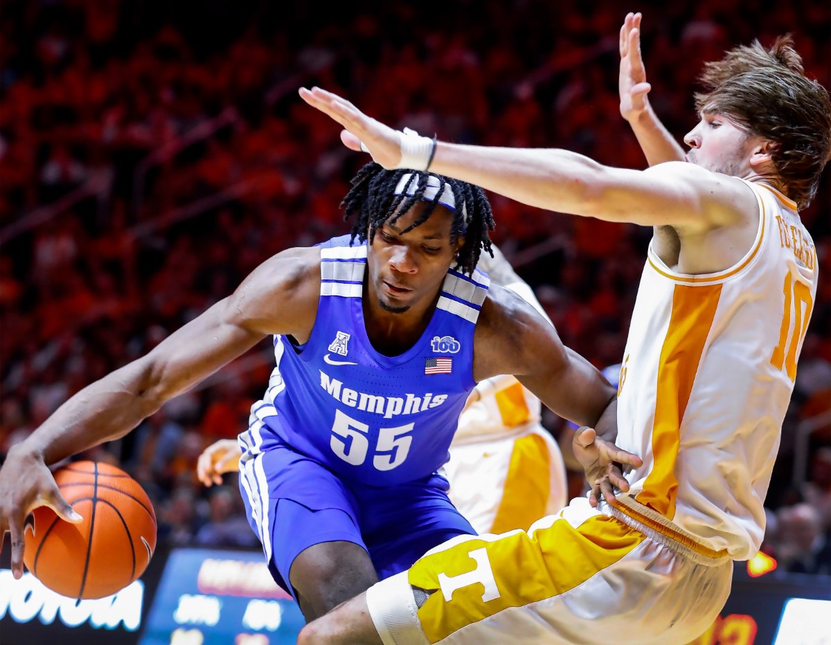 <strong>Memphis forward Precious Achiuwa (left) is called for a charging foul after running into Tennessee defender John Fulkerson (right) during action Saturday, Dec. 14, 2019 in Knoxville, Tennessee.</strong> (Mark Weber/Daily Memphian)