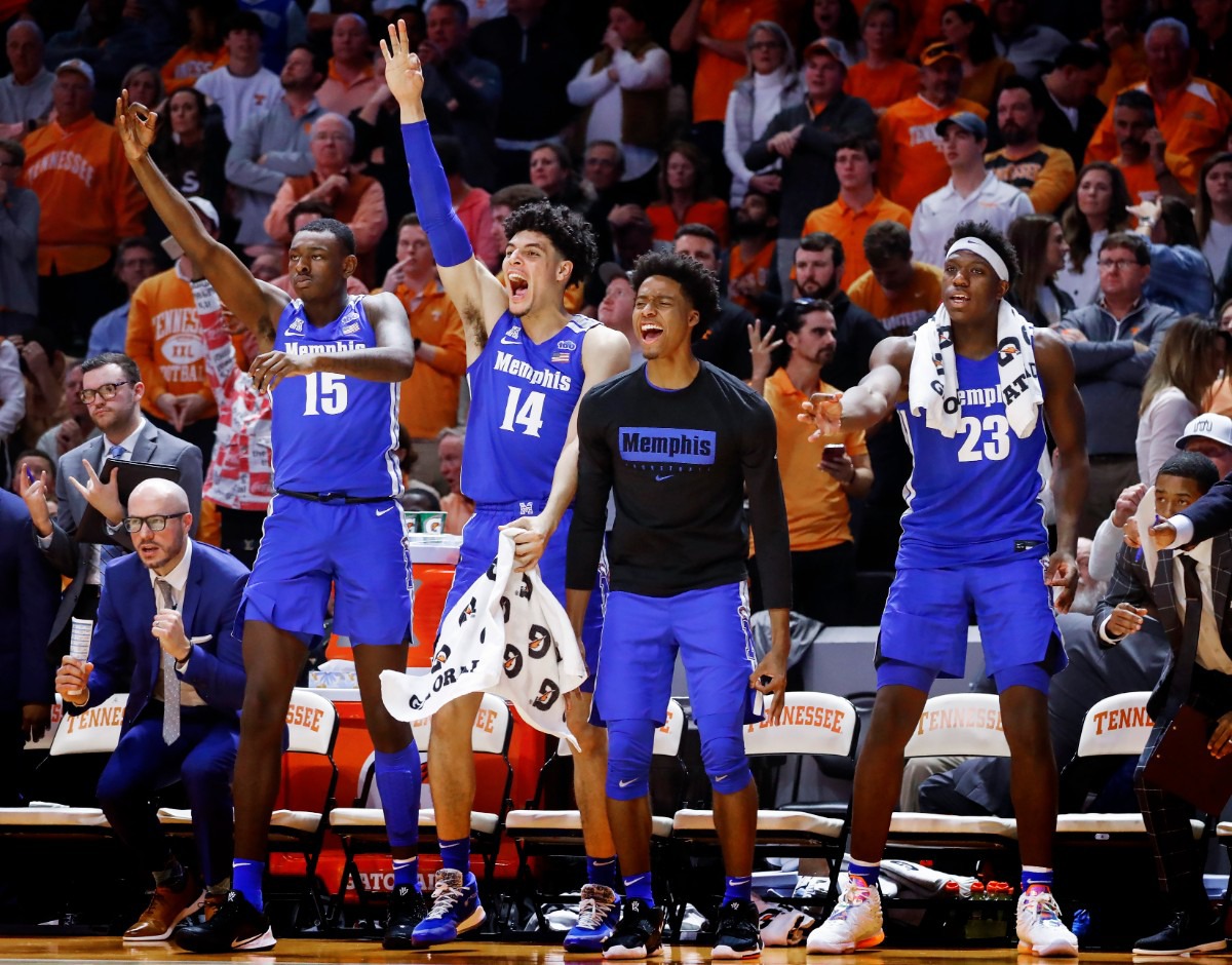 <strong>Memphis teammates (left to right) Lance Thomas, Isaiah Maurice, Jayden Hardaway and Malcolm Dandridge celebrate a made 3-pointer against Tennessee during action Saturday, Dec. 14, 2019 in Knoxville, Tennessee.</strong> (Mark Weber/Daily Memphian)