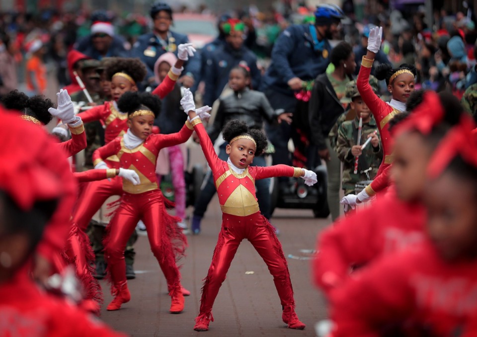 <strong>The Ford Road Elementary School Tigers perform during the 2019 Memphis Holiday Parade on Dec. 14, 2019. The parade brought thousands to Beale Street to watch dancers, bands, floats, classic cars and Santa usher in the holiday season.</strong> (Jim Weber/Daily Memphian)