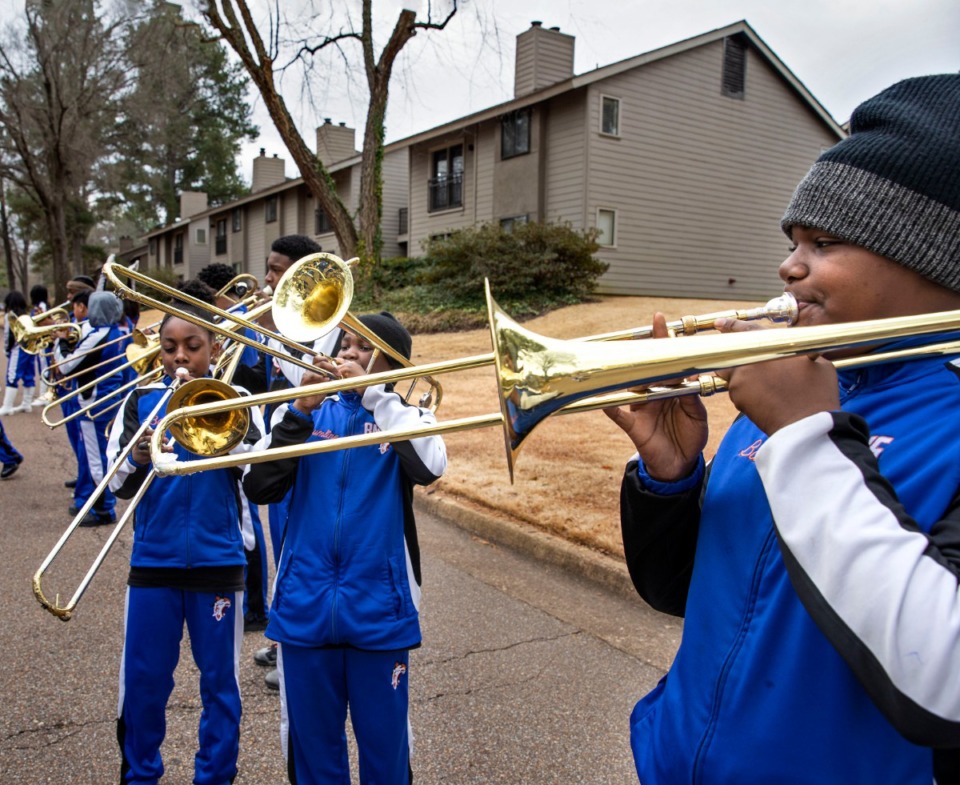 <strong>Members of Bellevue Middle School's marching band warm up before the start of the Germantown Christmas parade Dec. 14, 2019.</strong> (Mike Kerr/Special to Daily Memphian)