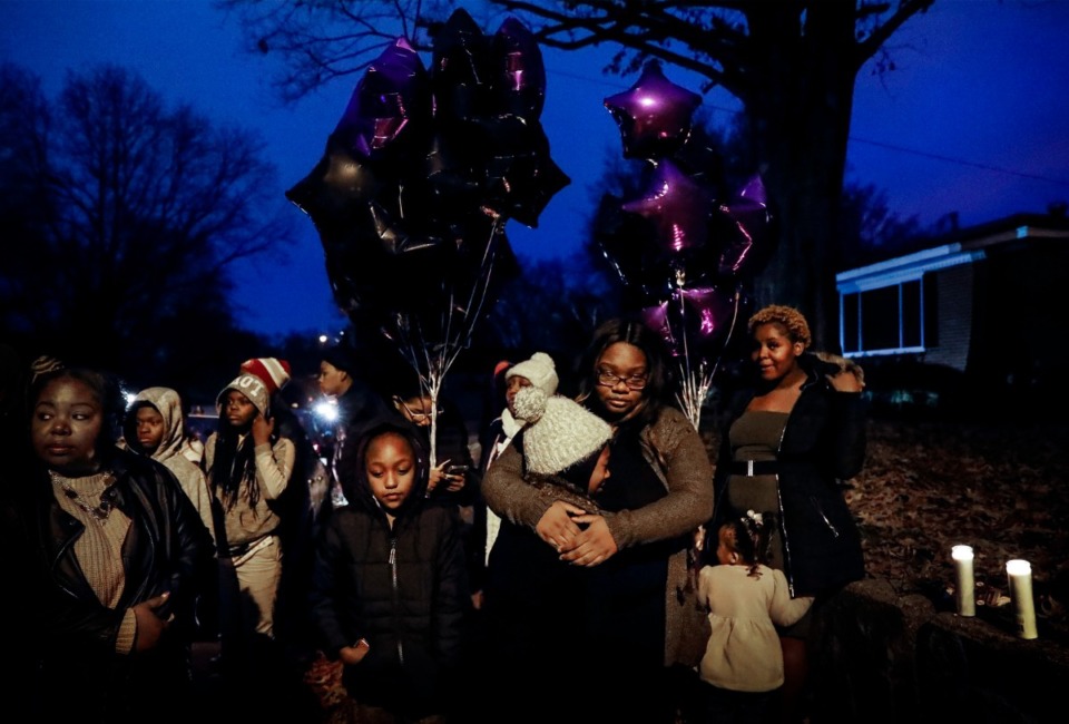 <strong>Family and friends of Demont'e Johnson, a 13-year-old killed on Dec. 8, attend a vigil on what would have been his 14th birthday on Dec. 10, 2019, in Orange Mound.</strong> (Mark Weber/Daily Memphian)