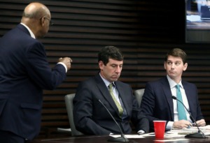 <strong>Outgoing Memphis City Council member Joe Brown (left) talks with fellow councilmembers Reid Hedgepeth (center) and Worth Morgan (right) during a Memphis City Council Executive session Dec. 17.</strong> (Patrick Lantrip/Daily Memphian)