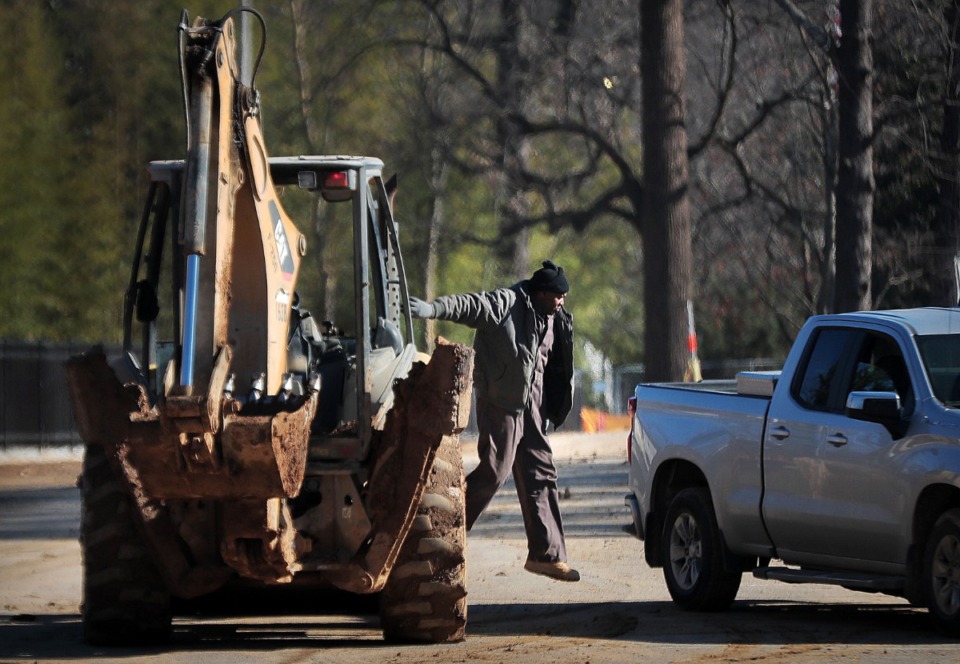 <strong>Construction work continues on the Prentiss Place surface lot west of the Memphis Zoo where city and zoo officials say a parking garage could be built to handle overflow parking. The city has paused its plans to expand the zoo parking lot into the Greensward as it reevaluates the possibility of a parking garage.</strong> (Jim Weber/Daily Memphian)