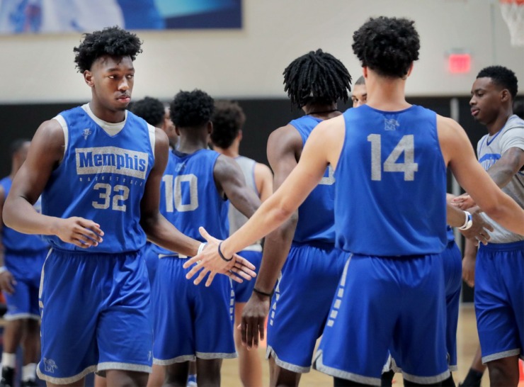 <strong>University of Memphis center James Wiseman (32) shakes hands with teammate Isaiah Maurice (14) during a team pro day held at the Laurie Walton Practice Facility on Oct. 7, 2019.</strong> (Patrick Lantrip/Daily Memphian)