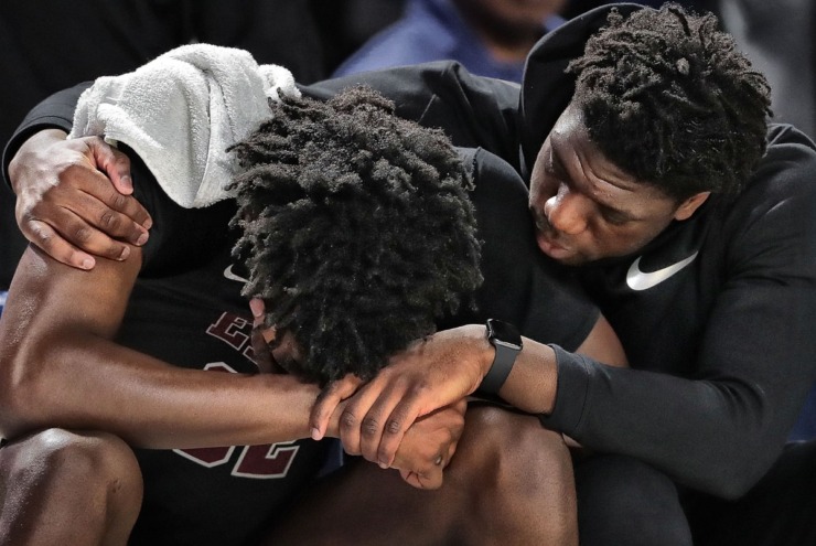 <strong>East High School's James Wiseman is comforted by Malcolm Dandridge (right) after Wiseman fouled out late in the 4th quarter during East's TSSAA Class AAA state basketball finals game against Bearden at MTSU in Murfreesboro on March 16, 2019.</strong> (Jim Weber/Daily Memphian)