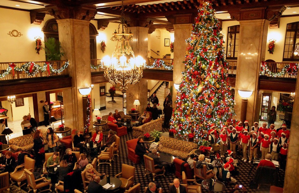 <strong>Christmas Day brunch on the mezzanine at The Peabody offers a view of the lobby Christmas tree.</strong> (Lance Murphey/Daily Memphian file)&nbsp;