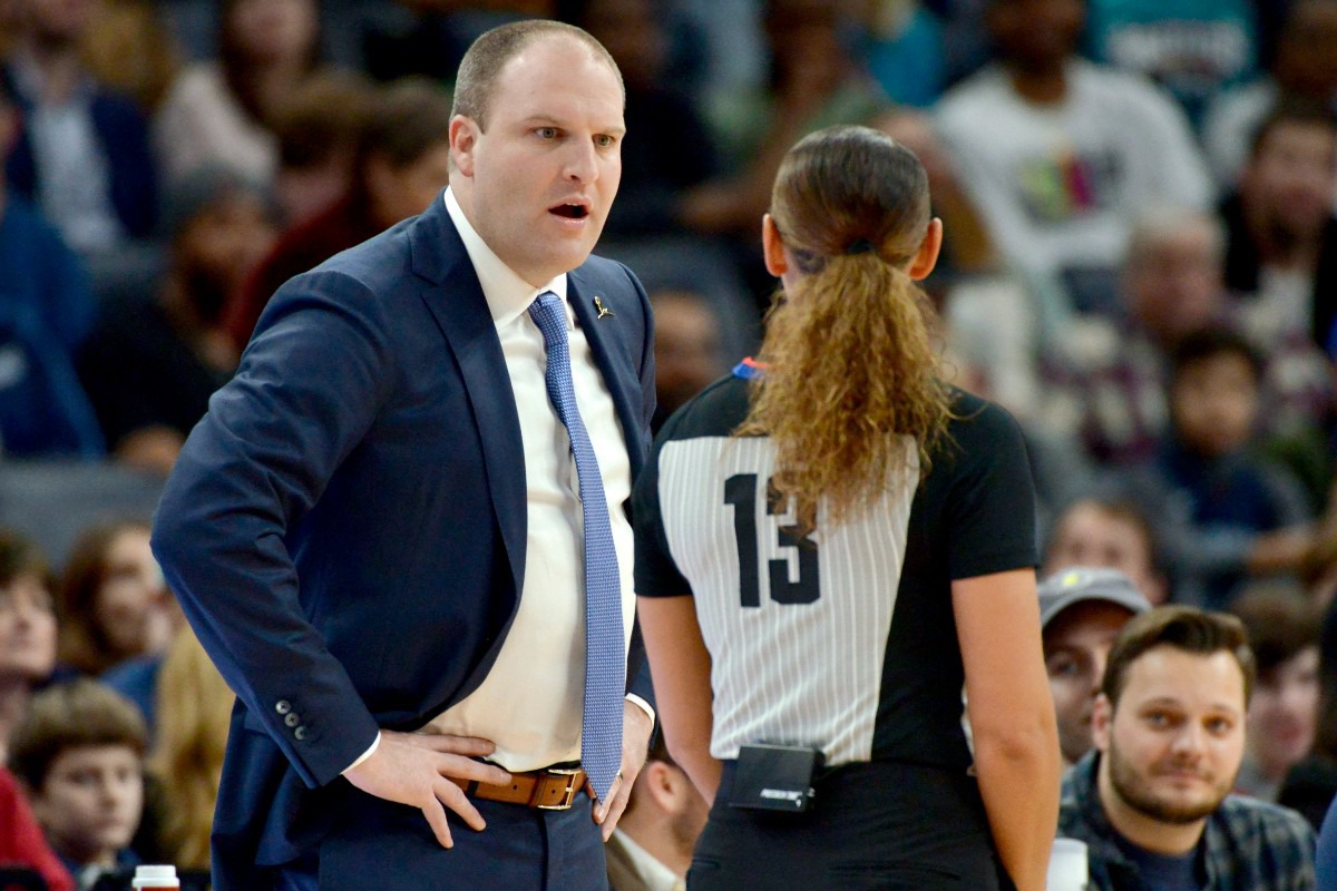 <strong>Memphis Grizzlies coach Taylor Jenkins, left, reacts to a referee's call&nbsp;Dec. 23 at FedExForum.</strong> (Brandon Dill/AP)