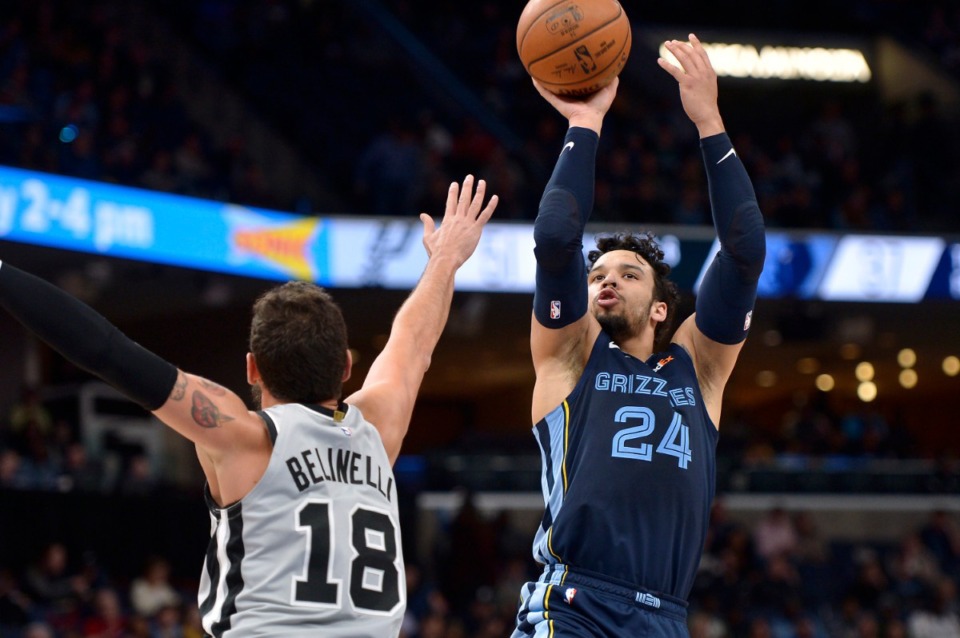 <strong>Memphis Grizzlies guard Dillon Brooks (24) shoots over San Antonio Spurs guard Marco Belinelli (18) during the first half of an NBA basketball game on Dec. 23, 2019, in Memphis.</strong> (AP Photo/Brandon Dill)