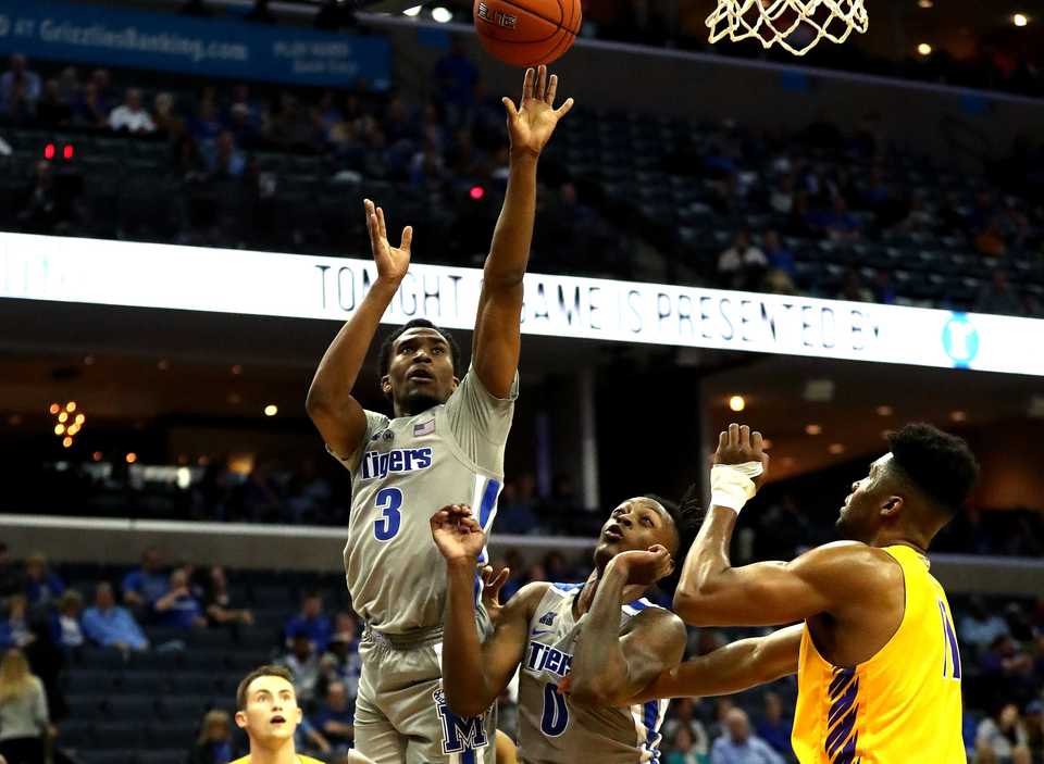 <strong>University of Memphis guard Jeremiah Martin (3) pulls up for a jump shot against Tennessee Tech in the season opener on Tuesday, Nov. 6, at FedExForum. The Tigers won, 76-61. </strong>(Houston Cofield/Daily Memphian)