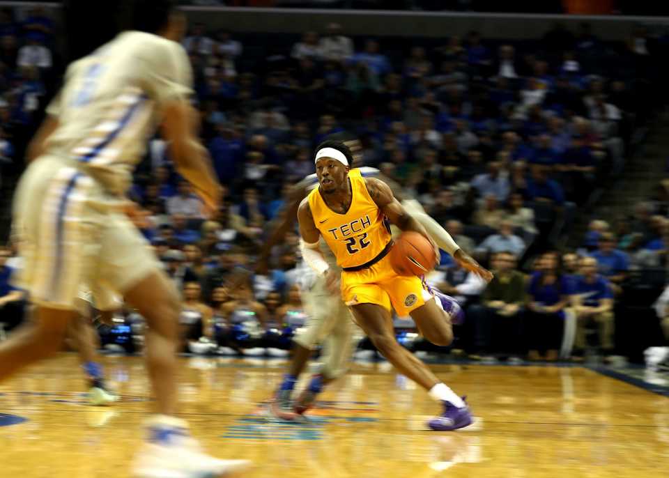 <strong>Tennessee Tech forward Courtney Alexander II (22) sprints down court in the season opener against the Memphis Tigers at FedExForum on Tuesday, Nov. 6. </strong>(Houston Cofield/Daily Memphian)