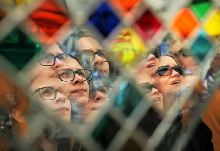 <strong>Ivy Mutchler-Lee (left) and her mother, Kathryn Mutchler-Lee, peruse the wares in The Glass House booth during the 47th annual Pink Palace Crafts Fair on Oct. 12, 2019, at Audubon Park. The event features some 200 craftsmen peddling a range of handmade goods including pottery, textiles, glass, jewelry and fine art to raise money for the Pink Palace family of museums.</strong> (Jim Weber/Daily Memphian)