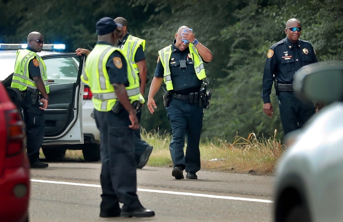 <strong>Memphis police officers work the scene of a shooting at I-240 between Lamar and Millbranch on July 10, 2019, where a man was reportedly shot by another motorist. The victim was transported in non-critical condition to Regional One Health. Memphis saw a spike in highway shootings in 2019.&nbsp;</strong>(Jim Weber/Daily Memphian)