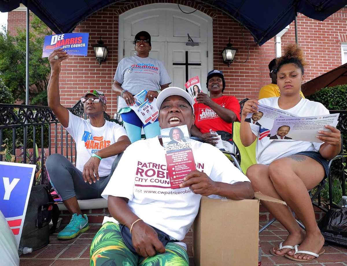 <strong>Nearly every eligible politician had a representative or two outside of Abundant Grace Fellowship Church in Whitehaven as early voters filed into the polling location on Sept. 20, 2019.</strong> (Patrick Lantrip/Daily Memphian)