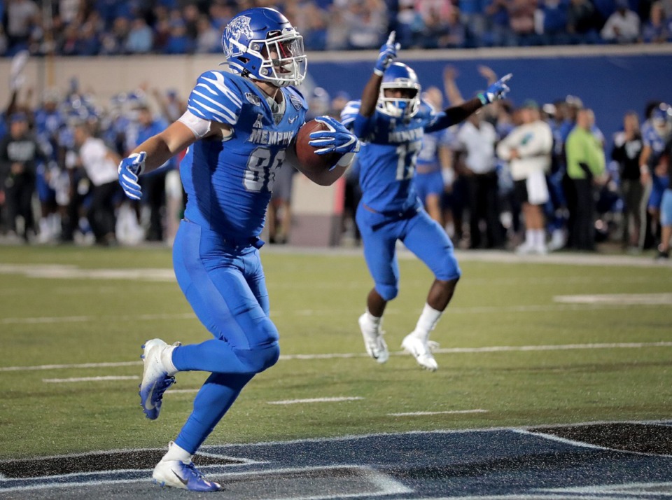 <strong>University of Memphis tight end Joey Magnifico (front, with ball), seen here scoring a touchdown against Tulane Oct. 19, is out for the Cotton Bowl with a knee injury.</strong> (Jim Weber/Daily Memphian)
