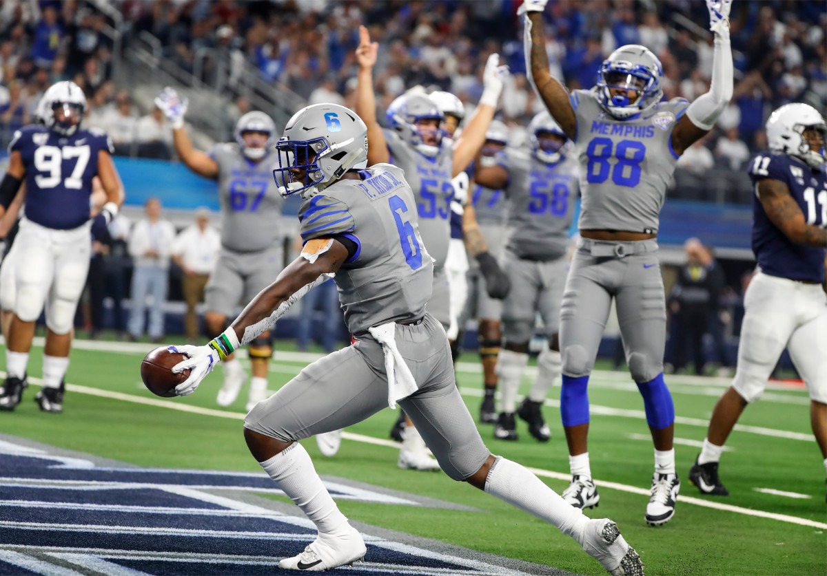 <strong>University of Memphis running back Patrick Taylor Jr. (middle) celebrates a touchdown against Penn State during action at the Cotton Bowl on Dec. 28, 2019, at AT&amp;T Stadium in Arlington, Texas.</strong> (Mark Weber/Daily Memphian)