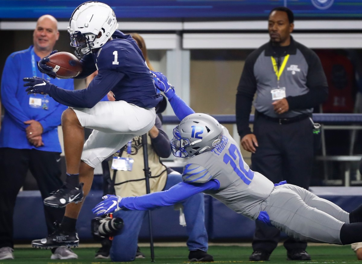 <strong>University of Memphis defender La'Andre Thomas (right) cannot bring down Penn State receiver KJ Hamler (left) during action at the Cotton Bowl on Dec. 28, 2019, at AT&amp;T Stadium in Arlington, Texas.</strong> (Mark Weber/Daily Memphian)