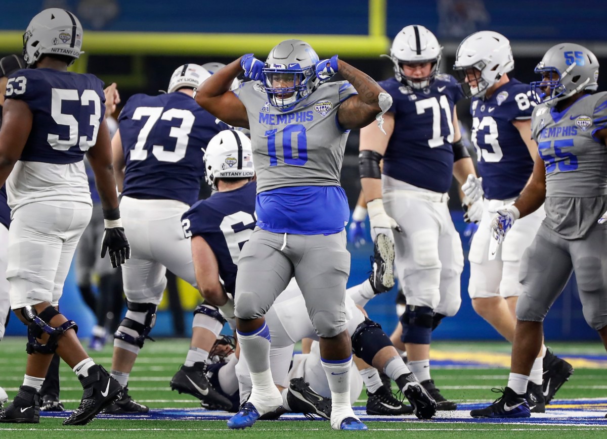 <strong>University of Memphis defender Morris Joseph (middle) celebrates a sack against Penn State during action at the Cotton Bowl on Dec. 28, 2019, at AT&amp;T Stadium in Arlington, Texas.</strong> (Mark Weber/Daily Memphian)