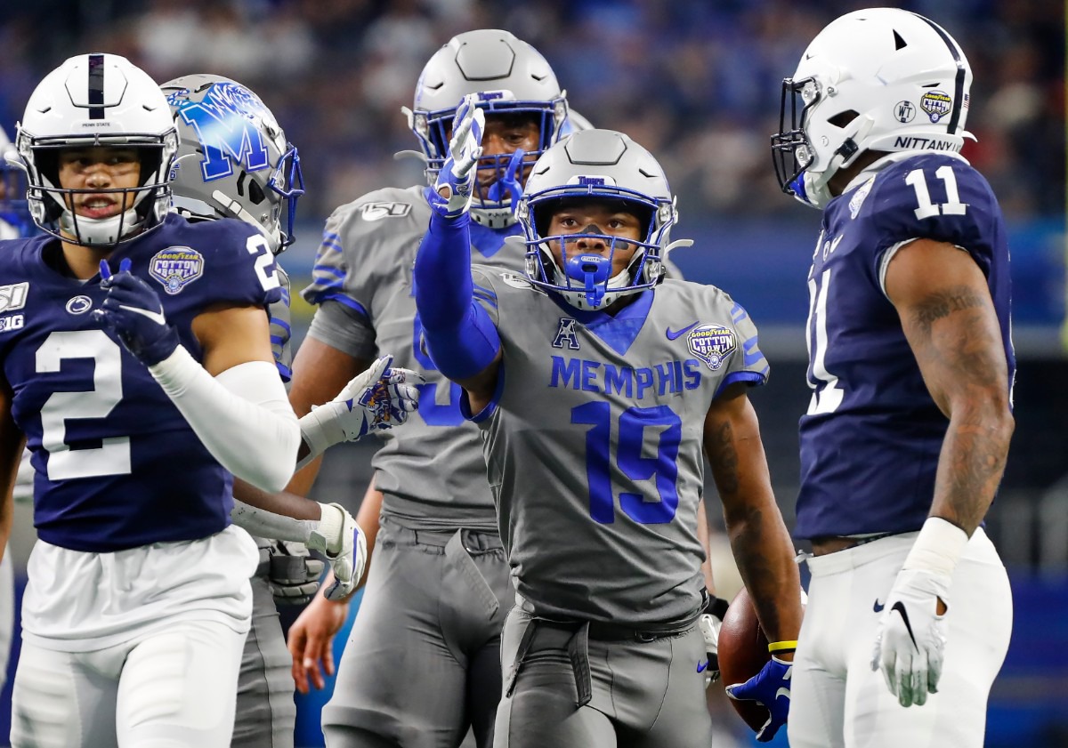 <strong>University of Memphis running back Kenneth Gainwell (middle) celebrates a first down against the Penn State defense during action at the Cotton Bowl on Dec. 28, 2019, at AT&amp;T Stadium in Arlington, Texas.</strong> (Mark Weber/Daily Memphian)