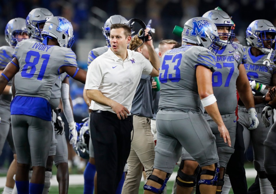 <strong>University of Memphis head coach Ryan Silverfield (middle) during a break in action against Penn State at the Cotton Bowl on Dec. 28, 2019, at AT&amp;T Stadium in Arlington, Texas.</strong> (Mark Weber/Daily Memphian)