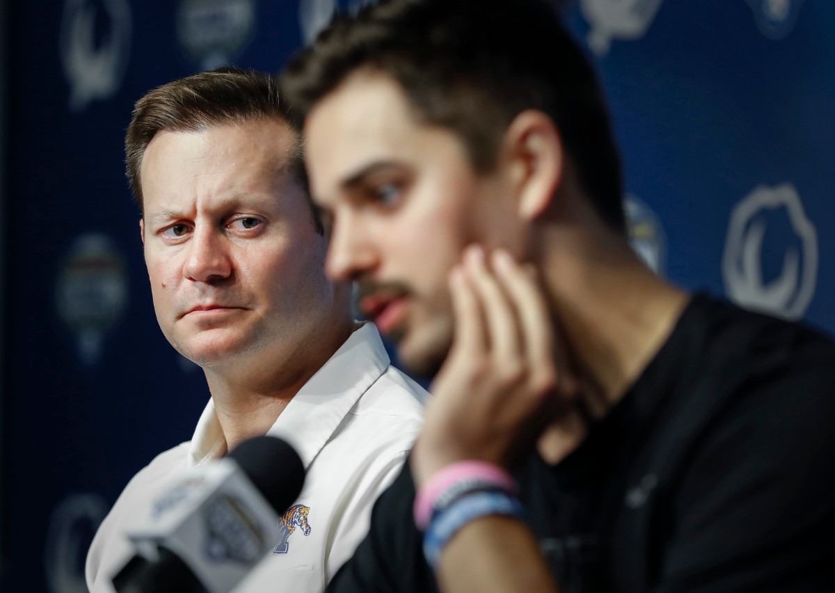 <strong>University of Memphis head coach Ryan Silverfield (left) listens to quarterback Brady White (right) during a post-game press conference after a 53-39 loss to Penn State at the Cotton Bowl on Dec. 28, 2019, at AT&amp;T Stadium in Arlington, Texas.</strong> (Mark Weber/Daily Memphian)