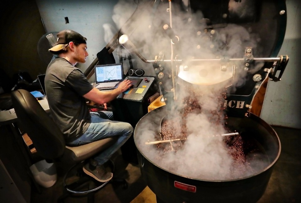 <strong>David Pitman roasts a batch of coffee at the J. Brooks Coffee Roasters facility in Memphis on Dec. 26, 2019. The new Grindhouse Coffee is roasted and packaged at the facility. Grindhouse owners say 25% of all proceeds from sales will benefit elementary schools in the Shelby County Schools system.</strong> (Jim Weber/Daily Memphian)