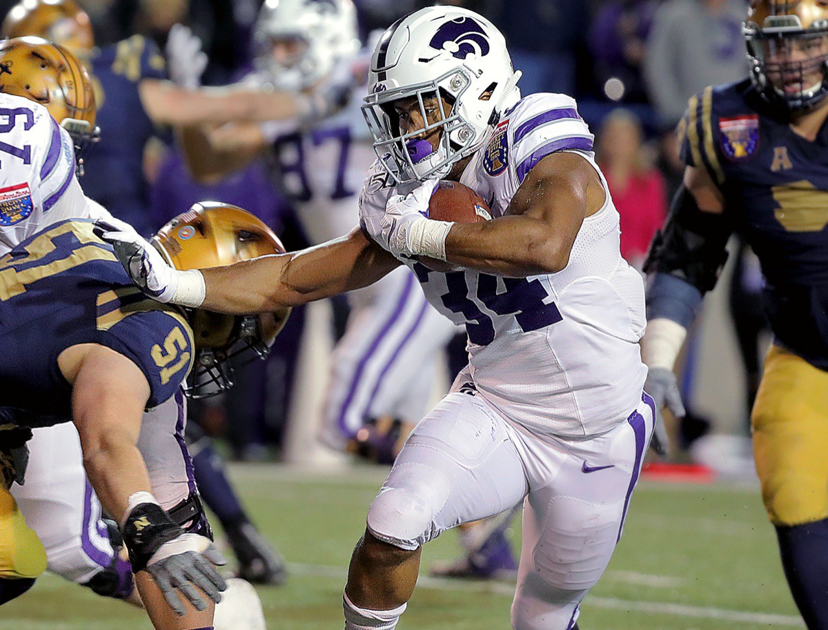 <strong>Kansas State University running back James Gilbert (34) rushes against the Navy defense during the 61st AutoZone Liberty Bowl Dec. 31, 2019.</strong> (Patrick Lantrip/Daily Memphian)