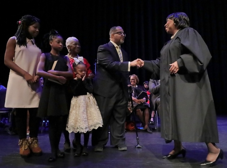 <strong>Newly-inaugurated Memphis City Court Clerk Myron Lowery shakes hands with U.S. Court of Appeals Sixth Circuit Judge Bernice Donald after getting sworn in by the latter at the University of Memphis on Jan. 1, 2020.</strong> (Patrick Lantrip/Daily Memphian)