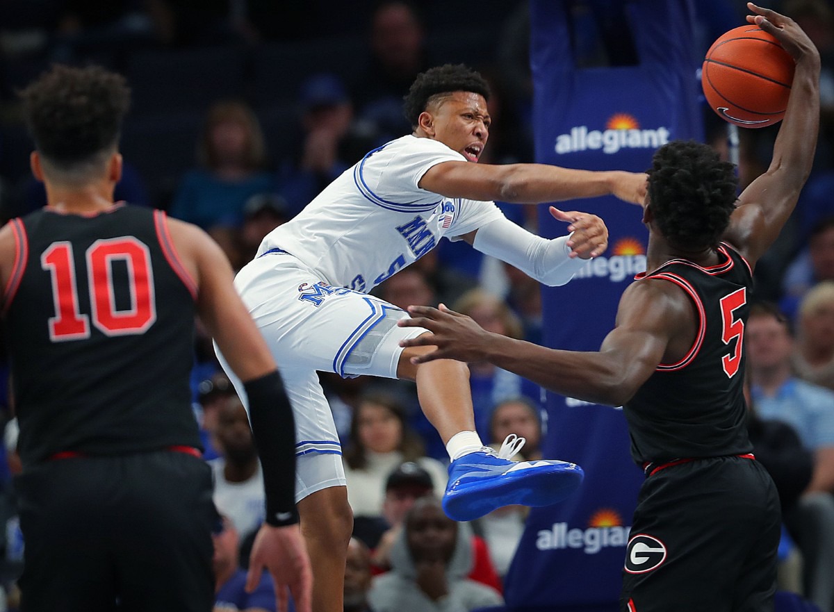 <strong>University of Memphis guard Boogie Ellis is fouled by the Bulldogs' Anthony Edwards during the Tigers' game on Jan. 4, 2020, against Georgia at the FedExForum.</strong> (Jim Weber/Daily Memphian)
