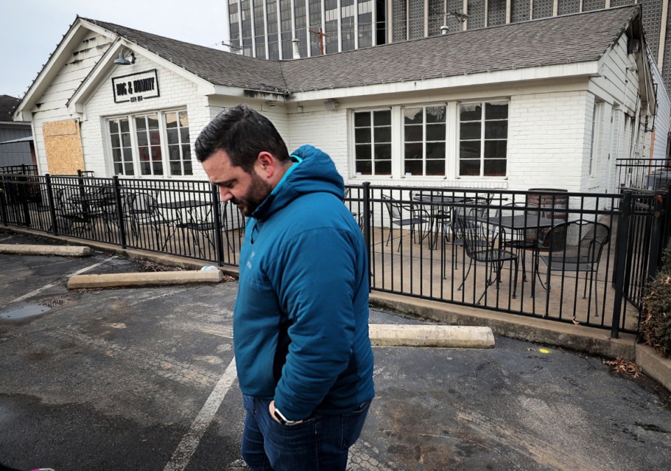 <strong>Chef Michael Hudman gauges the condition of his restaurant Hog &amp; Hominy on Jan. 9, 2020, after it burned overnight, suffering extensive damage to the building that was under renovation.</strong> (Jim Weber/Daily Memphian)