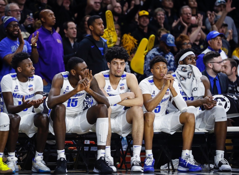 <strong>Memphis teammates (left to right) Damion Baugh, Lance Thomas, Isaiah Maurice, Boogie Ellis and Malcolm Dandridge watch from the bench during the final minutes of a 76-67 loss to Wichita State Jan. 9, 2020, in Wichita, Kansas.</strong> (Mark Weber/Daily Memphian)