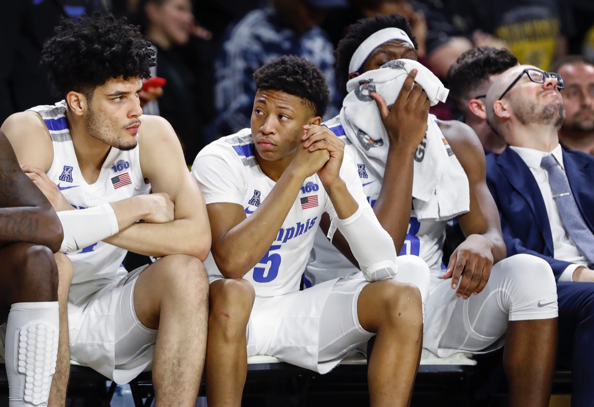 <strong>Memphis teammates (left to right) Isaiah Maurice, Boogie Ellis and Malcolm Dandridge watch from the bench during the final minutes of a 76-67 loss to Wichita State Jan. 9, 2020, in Wichita, Kansas.</strong> (Mark Weber/Daily Memphian)