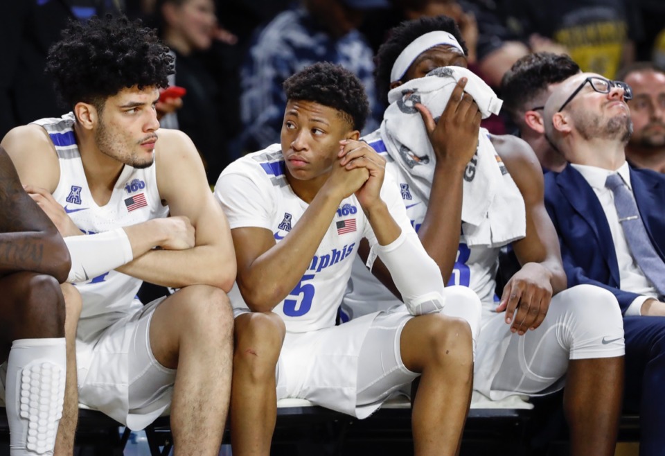 <strong>Memphis teammates (left to right) Isaiah Maurice, Boogie Ellis and Malcolm Dandridge watch from the bench during the final minutes of a 76-67 loss to Wichita State Jan. 9, 2020, in Wichita, Kansas.</strong>&nbsp;<strong>Getting this group back into winning form is a test for Penny Hardaway.</strong> (Mark Weber/Daily Memphian)