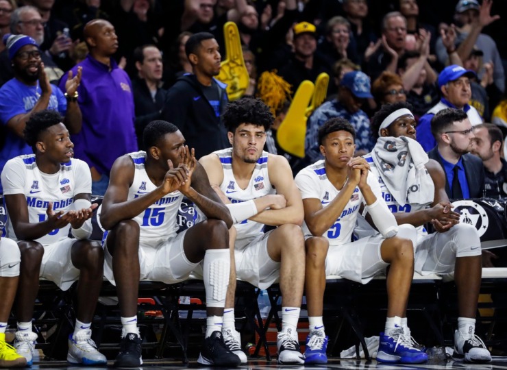 <strong>Memphis teammates (from left) Damion Baugh, Lance Thomas, Isaiah Maurice, Boogie Ellis and Malcolm Dandridge watch from the bench during the final minutes of a 76-67 loss to Wichita State&nbsp;on Jan. 9, 2020, in Wichita, Kansas.</strong> (Mark Weber/Daily Memphian)
