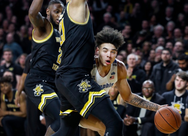 <strong>Memphis guard Lester Quinones (right) drives the lane against the Wichita State defense during action on Jan. 9, 2020, in Wichita, Kansas.&nbsp;</strong>(Mark Weber/Daily Memphian)
