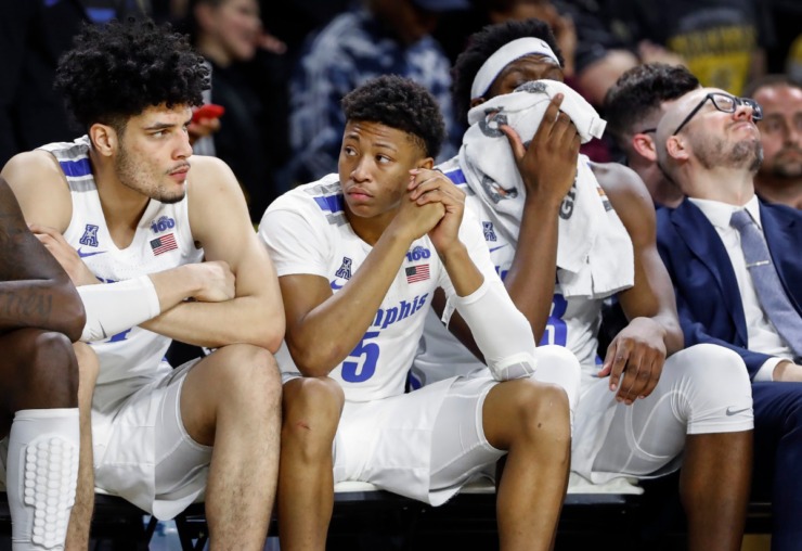 <strong>Memphis teammates (left to right) Isaiah Maurice, Boogie Ellis and Malcolm Dandridge watch from the bench during the final minutes of a 76-67 loss to Wichita State&nbsp;on Jan. 9, 2020, in Wichita, Kansas.</strong> (Mark Weber/Daily Memphian)