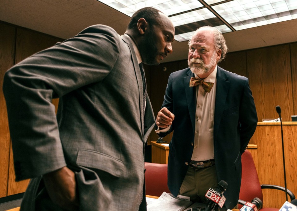 <strong>Shelby County Mayor Lee Harris (left) and Juvenile Court Judge Dan Michael </strong><strong>meet privately to discuss details following a press conference at juvenile court.</strong> (Houston Cofield/Special To The Daily Memphian file)
