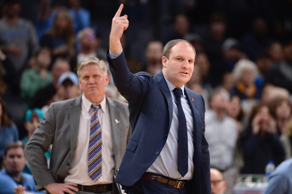 <strong>Memphis Grizzlies head coach Taylor Jenkins, right, and assistant coach Brad Jones stand on sideline in the second half of the NBA basketball game against the San Antonio Spurs, Friday, Jan. 10, 2020, at FedEzxForum.</strong> (Brandon Dill/AP)