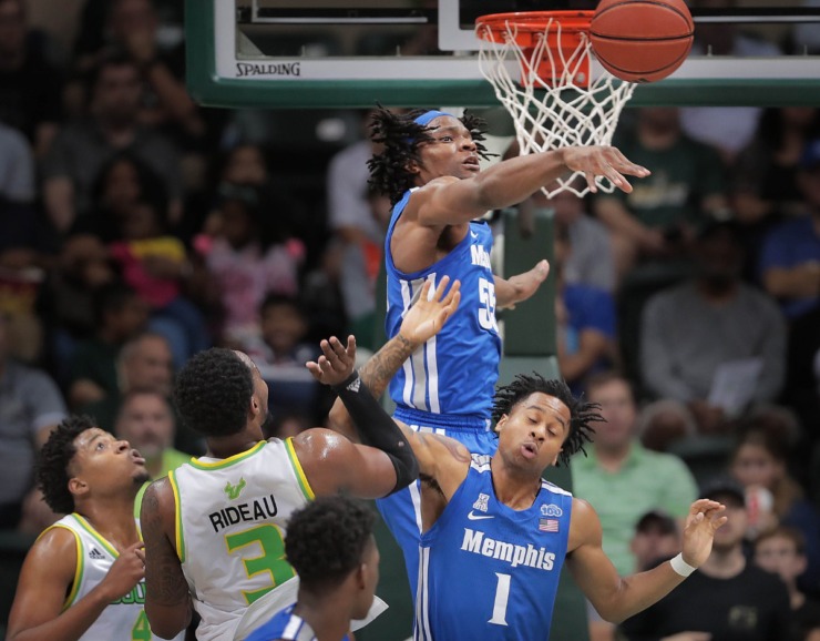 <strong>University of Memphis forward Precious Achiuwa (55) blocks a shot by the Bulls' Laquincy Rideau (3) during the Tigers' game on Jan. 12, 2020, against USF&nbsp;at the Yuengling Center in Tampa, Fla. </strong>&nbsp;(Jim Weber/Daily Memphian)