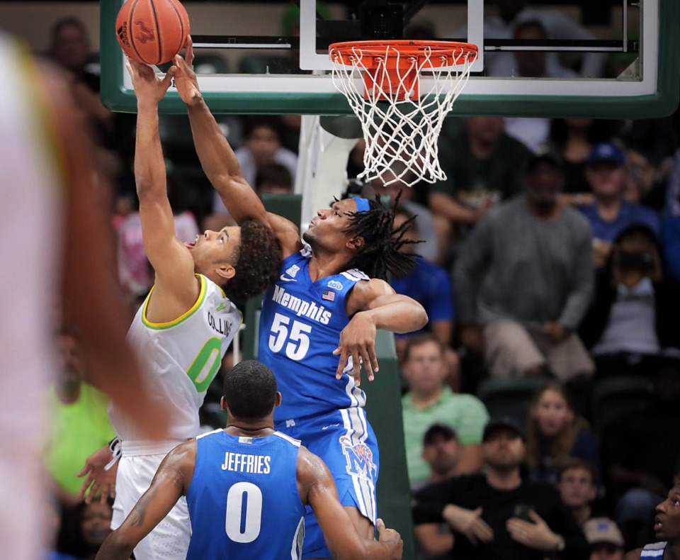 <strong>University of Memphis forward Precious Achiuwa (55) blocks a shot by the Bulls' David Collins (0) during the Tigers' game on Jan. 12, 2020, against USF at the Yuengling Center.</strong> (Jim Weber/Daily Memphian)