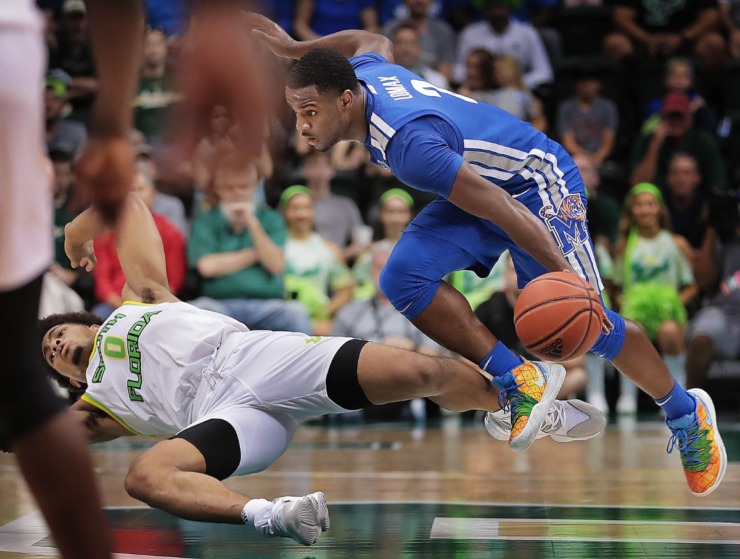 <strong>University of Memphis guard Alex Lomax (2) collides with the Bulls' David Collins during the Tigers' game on Jan. 12, 2020, against USF&nbsp;at the Yuengling Center in Tampa, Fla. </strong>(Jim Weber/Daily Memphian)