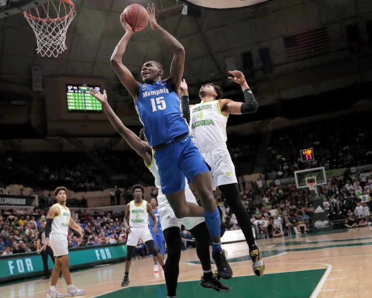 <strong>University of Memphis forward Lance Thomas shoots under pressure by the Bulls' Michael Durr (4) during the Tigers' game on Jan. 12, 2020, against USF&nbsp;at the Yuengling Center in Tampa, Fla. </strong>(Jim Weber/Daily Memphian)