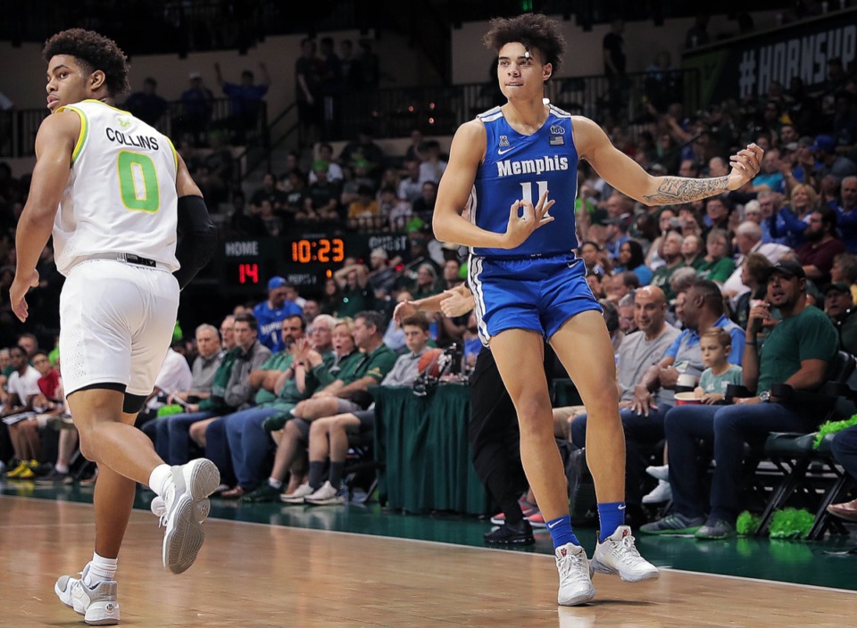 <strong>University of Memphis guard Lester Quinones shows his air-guitar swag after hitting a trey Jan. 12, 2020, against USF at the Yuengling Center.</strong> (Jim Weber/Daily Memphian)