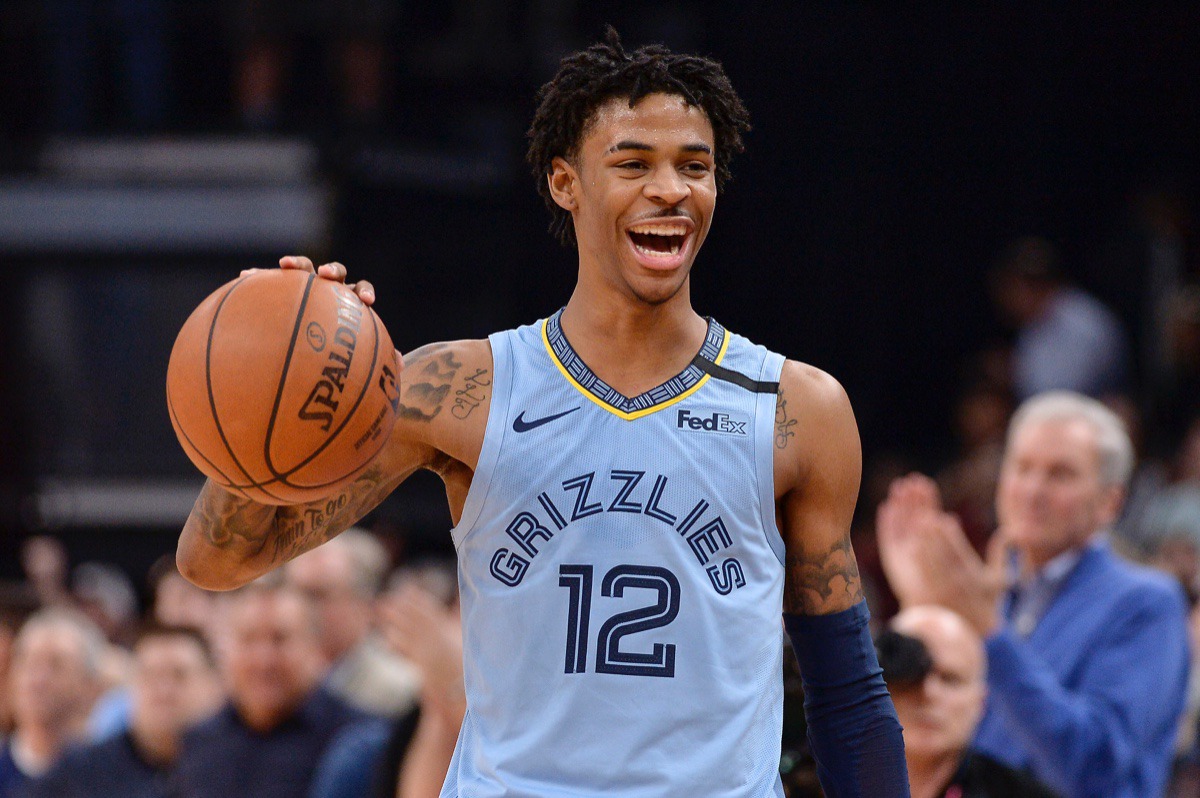 <strong>Memphis guard Ja Morant holds the ball while the Grizzlies run out the clock in an NBA basketball game against the Houston Rockets on Tuesday, Jan. 14, 2020, at FedExForum.</strong> (Brandon Dill/AP)