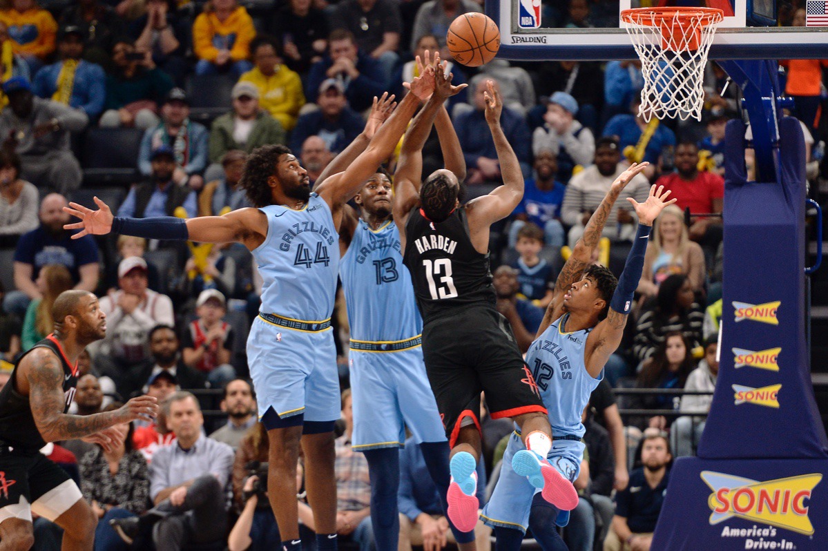 <strong>Houston Rockets guard James Harden (13) is blocked on a shot by Memphis Grizzlies forward Solomon Hill (44), forward Jaren Jackson Jr. (13) and guard Ja Morant (12) during the second half of an NBA basketball game Tuesday, Jan. 14, 2020, at FedExForum.</strong> (Brandon Dill/AP)