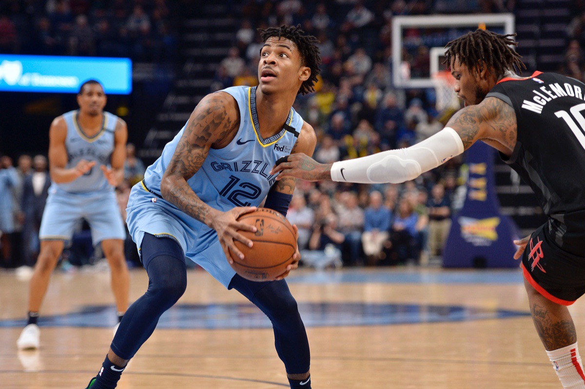 <strong>Memphis Grizzlies guard Ja Morant (12) is defended by Houston Rockets guard Ben McLemore (16) in the second half of an NBA basketball game Tuesday, Jan. 14, 2020, at FedExForum.</strong> (Brandon Dill/AP)